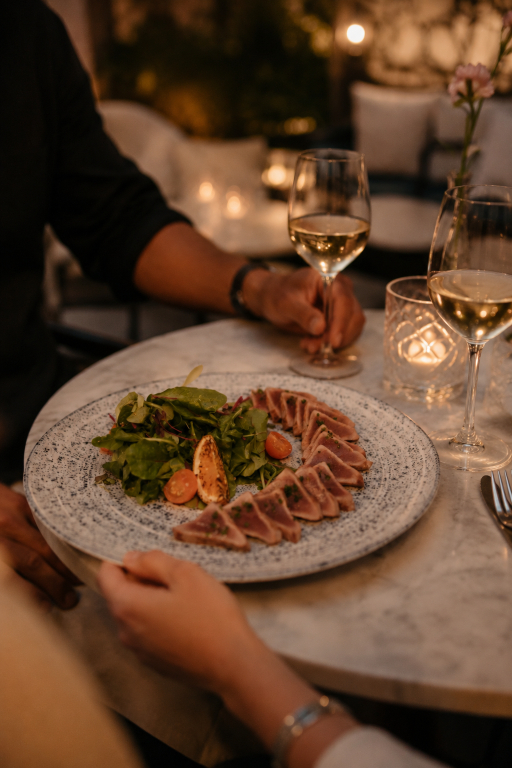 Couple enjoying Mediterranean food at Viu Restaurant in Palma